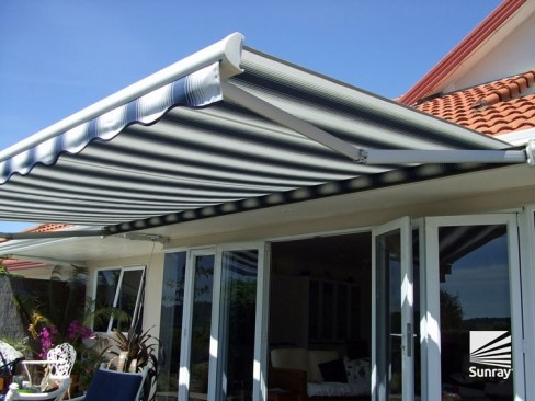 Felicia awning open and shading the homes deck